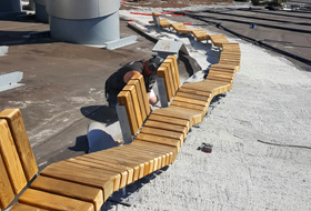 Wooden benches are being constructed