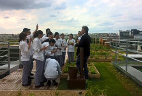Cookery school students on the rooftop garden