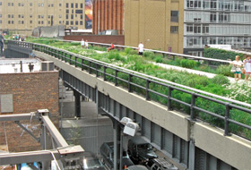Surrounded by asphalt and concrete, the green park on the elevated railway line