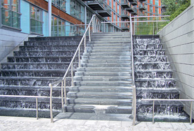 Water cascades down the steps