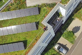 Green roof with solar panels from bird`s eye view
